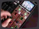 The DN-X1700 by Denon is a four-channel tabletop mixer with rubberised knobs, 60mm Alps K Series channel faders, 45mm FLEX cross fader, a color LCD display, extended 24-point LED channel and output metering, and LED ring metering around the control knobs.