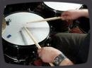 If you're new to drumming then all the different techniques involved can be daunting. With both hands and feet in action most of the time you're playing it can be difficult to know what aspects of technique to look at first. This video lesson shows you how to how to hold your drum sticks using the 'matched grip', and make basic strokes.