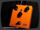Www.ProGuitarShop.com - The T-Rex Mudhoney Overdrive Pedal is a great combination of an overdrive / boost pedal. The Mudhoney features a +15db boost when the Volume control is turned all the way up, this gives it the power to push the front end of your amp. The Gain knob controls the amount of distortion (really?) and the Tone control interacts uniquely with the rest. The Tone control only affects the top edge of the signal not compromising the other frequencies. The Boost button takes the T-Rex Mudhoney from a low/medium gain pedal to a high gain monster. The T-Rex Mudhoney Overdrive pedal remains sweet at any setting. Using the Mudhoney at low gain levels as a clean boost, the transparent edgy boost is very usable and retains the primary characteristics of your sound while enhancing the dynamic response. With the Gain turned up the Mudhoney sings and wails with the best of 'em. Hit the Boost button and get ready to blast off with overdriven madness. Even detuned, the T-Rex Mudhoney Overdrive pedal holds up and brings the grungy low end to the heaviest of tunes.