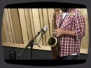 Enregistrement d'un saxophone à l'aide du micro Neumann TLM 102.